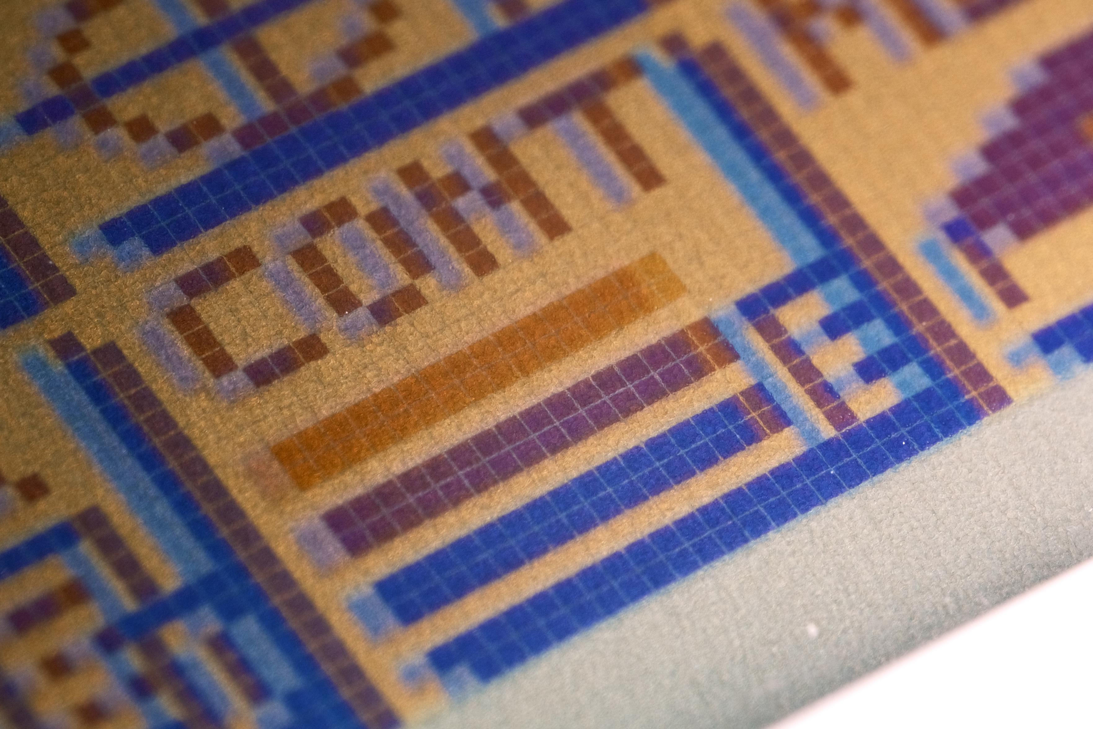 A photo of the same typical icon field, now titled CONT with three coloured bars beneath that. One is yellow, one purple and one blue