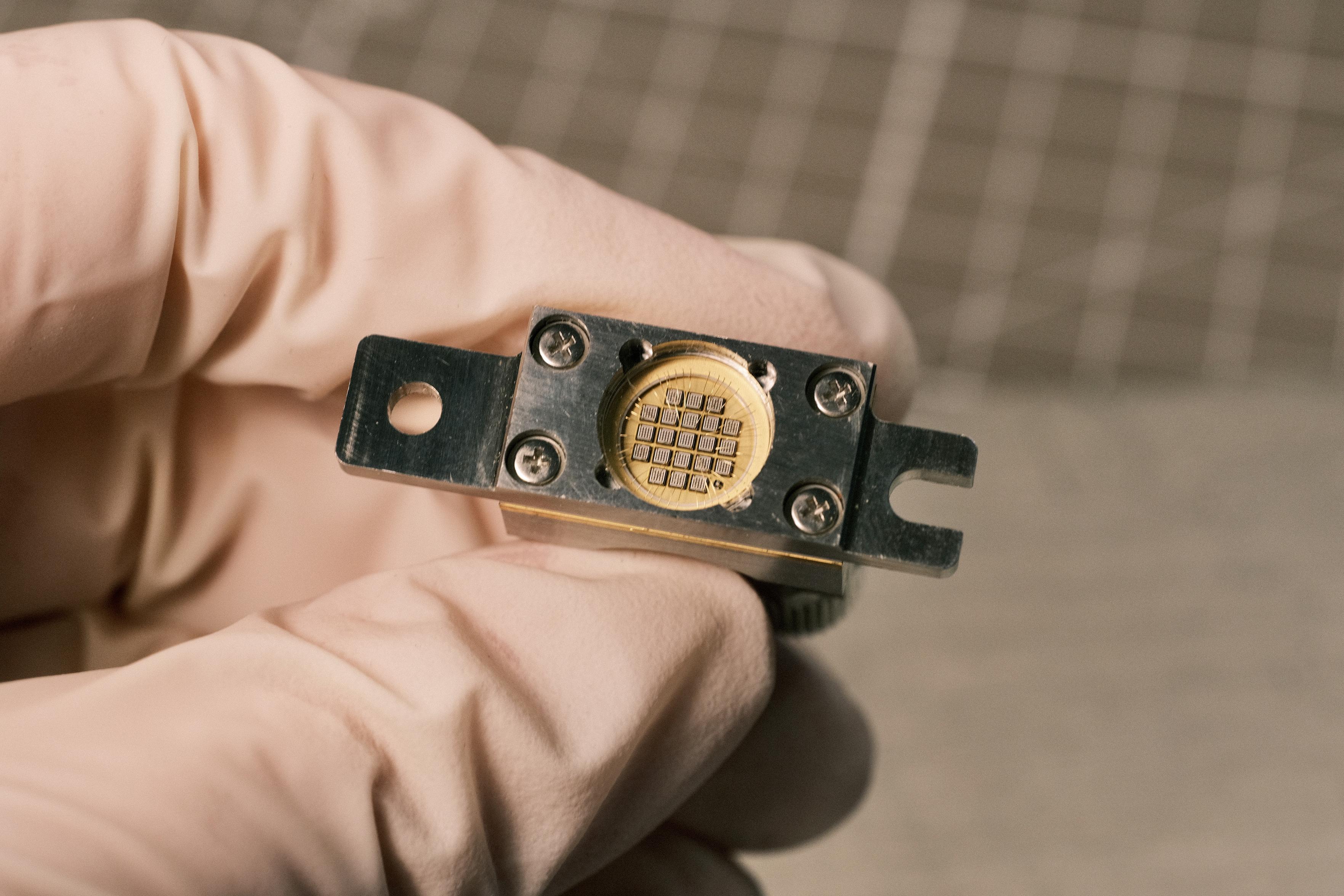 The led held by my gloved hand. It gives a size relation, it is just slightly larger than my thumb